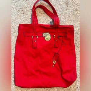 Michael Kors, tote bags, red color purse, gold fake hardware. Super cute.